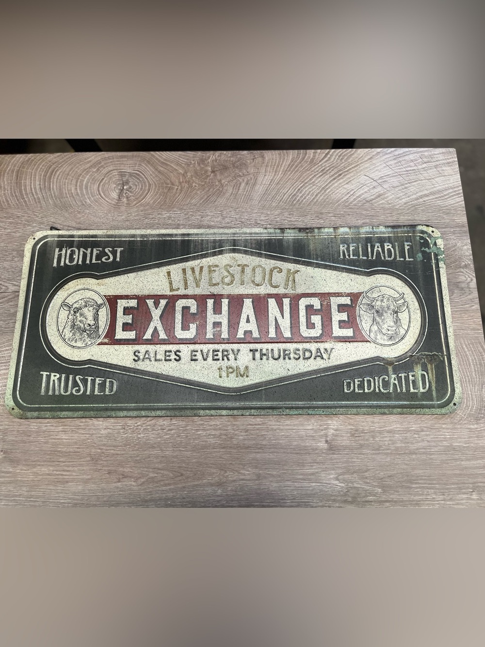 Vintage metal livestock exchange sign
